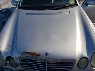 2000 Mercedes-Benz E-Class with VIN WDBJF82J5YX030071, listed as a Copart auction lot 42430025 with 122,612 mi miles and Salvage Title. Bid and sale history available at carsss.com. Image 11.