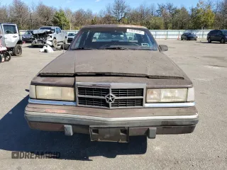 1989 Dodge Dynasty z VIN 1B3BC4637KD532206, wystawiony jako Copart lot #74233744 z przebiegiem 85 245 mil mil oraz Czysty tytuł • Clean title. Historia ofert i sprzedaży dostępna na DreamBid. Obrazek 5.