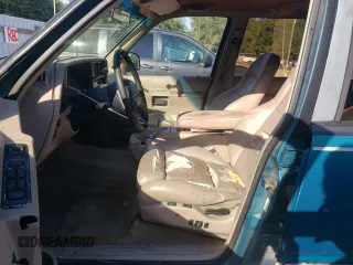 1994 Ford Explorer Eddie Bauer z VIN 1FMDU32X9RUE56887, wystawiony jako Copart lot #74450034 z przebiegiem 230 080 mil mil oraz Szkody całkowita. Historia ofert i sprzedaży dostępna na DreamBid. Obrazek 7.