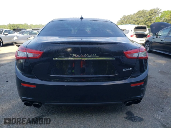 2016 Maserati Ghibli S с VIN ZAM57RSA2G1181033, выставлен на аукционе Copart как лот 52780575 с пробегом 105 266 миль миль и Списание • Salvage title. История ставок и продаж доступна на DreamBid. Изображение 6.
