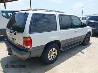 2001 Mercury Mountaineer z VIN 4M2ZU66P31UJ04943, wystawiony jako IAAI lot #42500919 z przebiegiem 222 991 mil mil oraz . Historia ofert i sprzedaży dostępna na DreamBid. Obrazek 4.