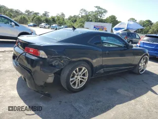 2014 Chevrolet Camaro LS z VIN 2G1FA1E35E9255913, wystawiony jako Copart lot #56976695 z przebiegiem 231 070 mil mil oraz Szkoda całkowita • Salvage title. Historia ofert i sprzedaży dostępna na DreamBid. Obrazek 3.