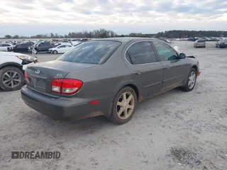 2002 Infiniti I35 Luxury with VIN JNKDA31A32T022128, listed as a IAAI auction lot 41384659 with 169,418 mi miles. Bid and sale history available at carsss.com. Image 4.