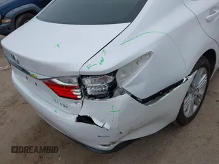 2014 Lexus ES 350 with VIN JTHBK1GG9E2148783, listed as a IAAI auction lot 41624707 with 130,481 mi miles. Bid and sale history available at carsss.com. Image 6.