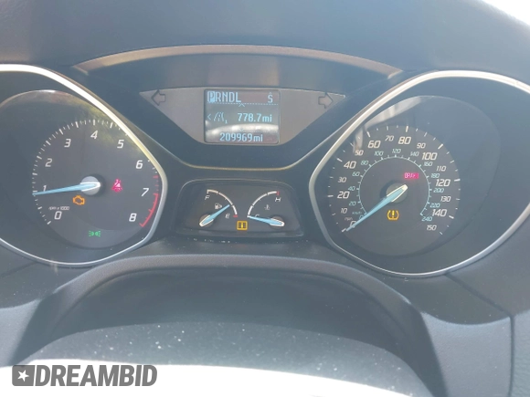 2012 Ford Focus SE z VIN 1FAHP3F23CL333598, wystawiony jako IAAI lot #41970172 z przebiegiem 209 969 mil mil oraz . Historia ofert i sprzedaży dostępna na DreamBid. Obrazek 7.
