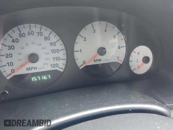 2005 Dodge Caravan SXT with VIN 1D4GP45R55B279825, listed as a IAAI auction lot 42532684 with 157,167 mi miles and . Bid and sale history available at DreamBid. Image 7.