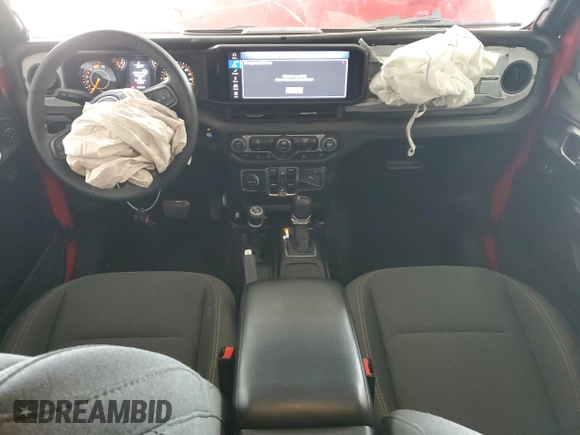 2024 Jeep Wrangler Sport S with VIN 1C4PJXDN5RW210582, listed as a Copart auction lot 47043845 with 18,593 mi miles and Salvage title. Bid and sale history available at DreamBid. Image 8.