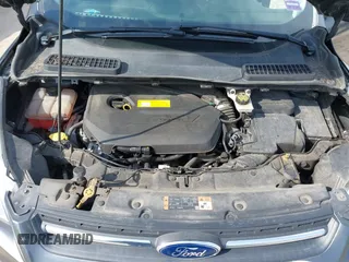 2015 Ford Escape SE with VIN 1FMCU0GXXFUB99852, listed as a IAAI auction lot 41704198 with 84,735 mi miles. Bid and sale history available at carsss.com. Image 10.