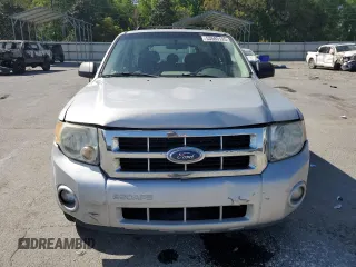 2008 Ford Escape XLS z VIN 1FMCU02ZX8KB15214, wystawiony jako Copart lot #53585195 z przebiegiem 241 310 mil mil oraz Szkoda całkowita • Salvage title. Historia ofert i sprzedaży dostępna na DreamBid. Obrazek 5.