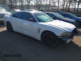2013 Dodge Charger RT with VIN 2C3CDXCT7DH583673, listed as a IAAI auction lot 41370924 with 133,474 mi miles. Bid and sale history available at carsss.com. Image 1.