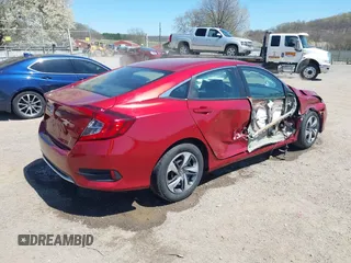 2021 Honda Civic LX z VIN 2HGFC2F67MH511569, wystawiony jako IAAI lot #42065379 z przebiegiem 45 486 mil mil oraz . Historia ofert i sprzedaży dostępna na DreamBid. Obrazek 4.