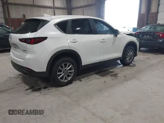 2023 Mazda CX-5 2.5 S with VIN JM3KFBAMXP0153362, listed as a IAAI auction lot 41875188 with 57,648 mi miles. Bid and sale history available at carsss.com. Image 4.
