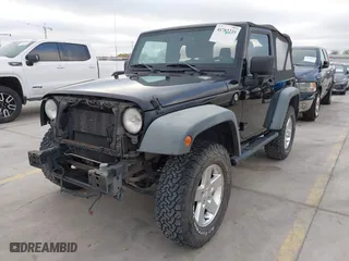 2014 Jeep Wrangler Sport with VIN 1C4AJWAG6EL311924, listed as a IAAI auction lot 41782235 with 123,517 mi miles. Bid and sale history available at carsss.com. Image 18.