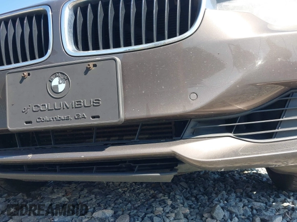 2014 BMW 3 Series 328i with VIN WBA3A5G57ENP28138, listed as a IAAI auction lot 41760371 with 147,897 mi miles and . Bid and sale history available at DreamBid. Image 16.