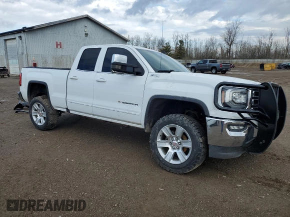 2019 GMC Sierra 1500 SLE z VIN 2GTV2MEC0K1170652, wystawiony jako Copart lot #53474495 z przebiegiem 58 181 mil mil oraz Czysty tytuł • Clean title. Historia ofert i sprzedaży dostępna na DreamBid. Obrazek 4.