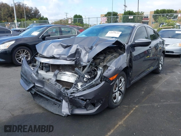 2018 Honda Civic LX with VIN 2HGFC2F58JH514161, listed as a IAAI auction lot 42073133 with 117,658 mi miles. Bid and sale history available at carsss.com. Image 2.