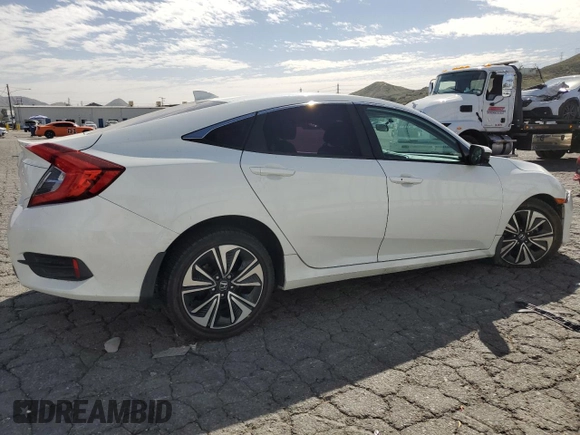 2016 Honda Civic Sedan EX-T with VIN 2HGFC1F34GH640292, listed as a Copart auction lot 47135365 with 101,728 mi miles and Salvage Title. Bid and sale history available at carsss.com. Image 3.
