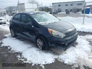 2013 Kia Rio LX with VIN KNADM5A37D6194117, listed as a IAAI auction lot 41522784 with 125,325 mi miles. Bid and sale history available at carsss.com. Image 1.