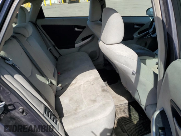 2011 Toyota Prius I z VIN JTDKN3DUXB1408821, wystawiony jako Copart lot #51702425 z przebiegiem 234 255 mil mil oraz Czysty tytuł • Clean title. Historia ofert i sprzedaży dostępna na DreamBid. Obrazek 10.