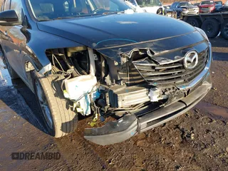 2014 Mazda CX-9 Grand Touring with VIN JM3TB3DV4E0444558, listed as a IAAI auction lot 41538130 with 113,050 mi miles and . Bid and sale history available at DreamBid. Image 6.