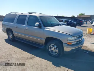 2001 Chevrolet Suburban LS z VIN 3GNFK16T41G140679, wystawiony jako IAAI lot #42783984 z przebiegiem 98 342 mil mil oraz . Historia ofert i sprzedaży dostępna na DreamBid. Obrazek 1.