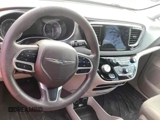 2017 Chrysler Pacifica Touring with VIN 2C4RC1DG5HR764942, listed as a IAAI auction lot 42255421 with 64,381 mi miles and . Bid and sale history available at DreamBid. Image 18.