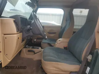 2001 Jeep Wrangler Sahara with VIN 1J4FA59S51P324010, listed as a Copart auction lot 43264515 with 163,056 mi miles and Salvage Title. Bid and sale history available at carsss.com. Image 7.