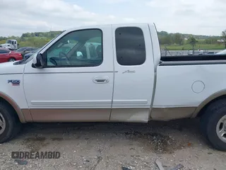 2003 Ford F-150 XL with VIN 1FTRX17L33NB79733, listed as a IAAI auction lot 42023385 with 136,236 mi miles. Bid and sale history available at carsss.com. Image 14.