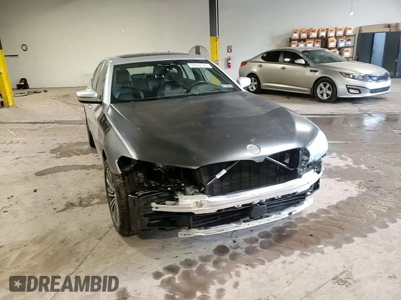 2019 BMW 5 Series 530e xDrive with VIN WBAJB1C56KB376153, listed as a Copart auction lot 58242585 with 67,638 mi miles and Salvage title. Bid and sale history available at DreamBid. Image 14.