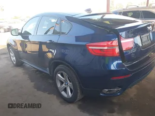 2013 BMW X6 xDrive50i z VIN 5UXFG8C51DL591955, wystawiony jako IAAI lot #41392374 z przebiegiem 112 899 mil mil oraz . Historia ofert i sprzedaży dostępna na DreamBid. Obrazek 3.