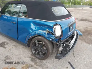 2022 MINI Convertible Cooper S z VIN WMW43DL06N3P19784, wystawiony jako IAAI lot #42635816 z przebiegiem 17 053 mil mil oraz . Historia ofert i sprzedaży dostępna na DreamBid. Obrazek 6.