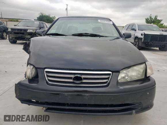 2001 Toyota Camry CE z VIN 4T1BG22K71U032545, wystawiony jako Copart lot #60883095 z przebiegiem 199 864 mil mil oraz Czysty tytuł • Clean title. Historia ofert i sprzedaży dostępna na DreamBid. Obrazek 5.