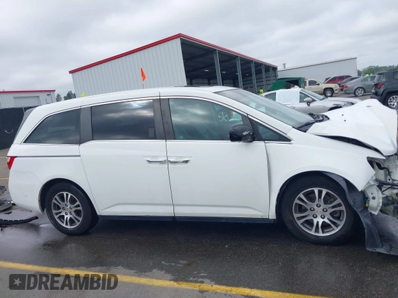 2012 Honda Odyssey EX-L with VIN 5FNRL5H60CB134954, listed as a IAAI auction lot 41942488 with 192,069 mi miles and . Bid and sale history available at DreamBid. Image 14.
