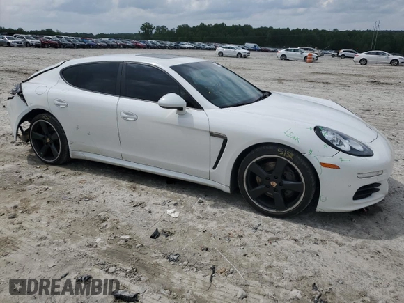2014 Porsche Panamera z VIN WP0AA2A76EL010143, wystawiony jako Copart lot #54750715 z przebiegiem 132 333 mil mil oraz Szkoda całkowita • Salvage title. Historia ofert i sprzedaży dostępna na DreamBid. Obrazek 4.