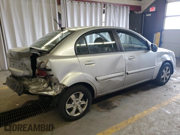 2010 Kia Rio LX with VIN KNADH4A34A6643716, listed as a Copart auction lot 46880375 with 112,265 mi miles and Salvage Title. Bid and sale history available at carsss.com. Image 3.