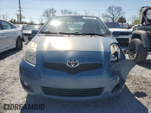2011 Toyota Yaris with VIN JTDJT4K35B5330328, listed as a Copart auction lot 46904665 with 107,100 mi miles and Salvage Title. Bid and sale history available at carsss.com. Image 5.