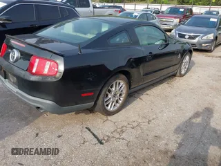2012 Ford Mustang V6 Premium with VIN 1ZVBP8AM8C5220642, listed as a IAAI auction lot 42110826 with 106,322 mi miles. Bid and sale history available at carsss.com. Image 4.