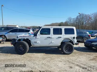 2022 Jeep Wrangler Unlimited Rubicon z VIN 1C4JJXFGXNW121489, wystawiony jako IAAI lot #41749550 z przebiegiem 56 601 mil mil oraz . Historia ofert i sprzedaży dostępna na DreamBid. Obrazek 15.