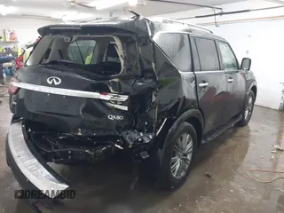 2021 Infiniti QX80 Luxe with VIN JN8AZ2AE7M9271868, listed as a IAAI auction lot 41220686 with 60,782 mi miles and . Bid and sale history available at DreamBid. Image 4.