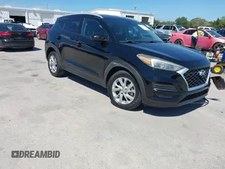 2019 Hyundai Tucson Value z VIN KM8J33A41KU019176, wystawiony jako IAAI lot #42046961 z przebiegiem 92 999 mil mil oraz . Historia ofert i sprzedaży dostępna na DreamBid. Obrazek 1.