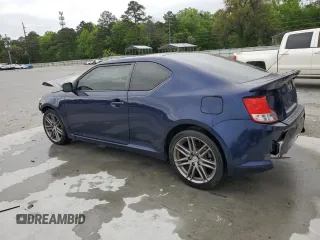 2013 Scion tC z VIN JTKJF5C79D3062325, wystawiony jako Copart lot #53340955 z przebiegiem Nie podano mil oraz Szkoda całkowita • Salvage title. Historia ofert i sprzedaży dostępna na DreamBid. Obrazek 2.