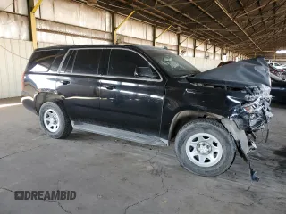 2015 Chevrolet Tahoe Commercial with VIN 1GNSK3EC5FR293350, listed as a Copart auction lot 83570834 with Not provided miles and Salvage title. Bid and sale history available at DreamBid. Image 4.