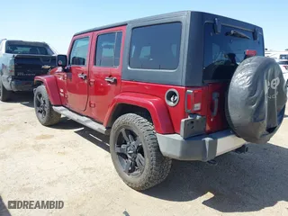 2011 Jeep Wrangler Unlimited Sahara with VIN 1J4BA5H15BL557871, listed as a IAAI auction lot 41922328 with 206,581 mi miles. Bid and sale history available at carsss.com. Image 3.