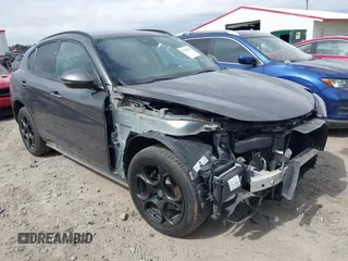 2018 Alfa Romeo Stelvio Sport z VIN ZASFAKPN3J7B76867, wystawiony jako IAAI lot #41758254 z przebiegiem 80 269 mil mil oraz . Historia ofert i sprzedaży dostępna na DreamBid. Obrazek 1.