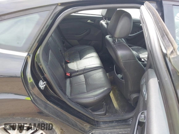 2014 Ford Focus Titanium with VIN 1FADP3N25EL194433, listed as a IAAI auction lot 42512912 with 105,355 mi miles and . Bid and sale history available at DreamBid. Image 8.