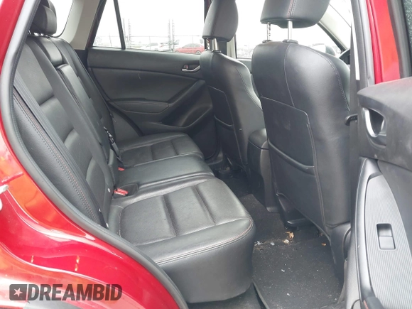 2015 Mazda CX-5 Grand Touring with VIN JM3KE4DY6F0501072, listed as a IAAI auction lot 41534176 with 90,160 mi miles. Bid and sale history available at carsss.com. Image 8.