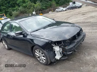 2014 Volkswagen Jetta SE z VIN 3VWD17AJ7EM370619, wystawiony jako IAAI lot #42668263 z przebiegiem 102 336 mil mil oraz . Historia ofert i sprzedaży dostępna na DreamBid. Obrazek 1.