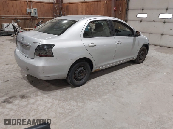 2008 Toyota Yaris with VIN JTDBT903781251568, listed as a IAAI auction lot 42090260 with 264,356 mi miles. Bid and sale history available at carsss.com. Image 4.