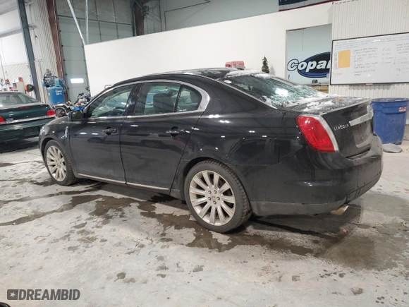 2012 Lincoln MKS with VIN 1LNHL9ER5CG806929, listed as a Copart auction lot 85328514 with 155,015 mi miles and Salvage Title. Bid and sale history available at carsss.com. Image 2.