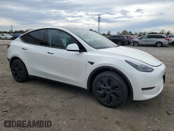 2025 Tesla Model Y Long Range with VIN 7SAYGDED5SF241318, listed as a Copart auction lot 51614245 with 3,682 mi miles and Salvage Title. Bid and sale history available at DreamBid. Image 4.